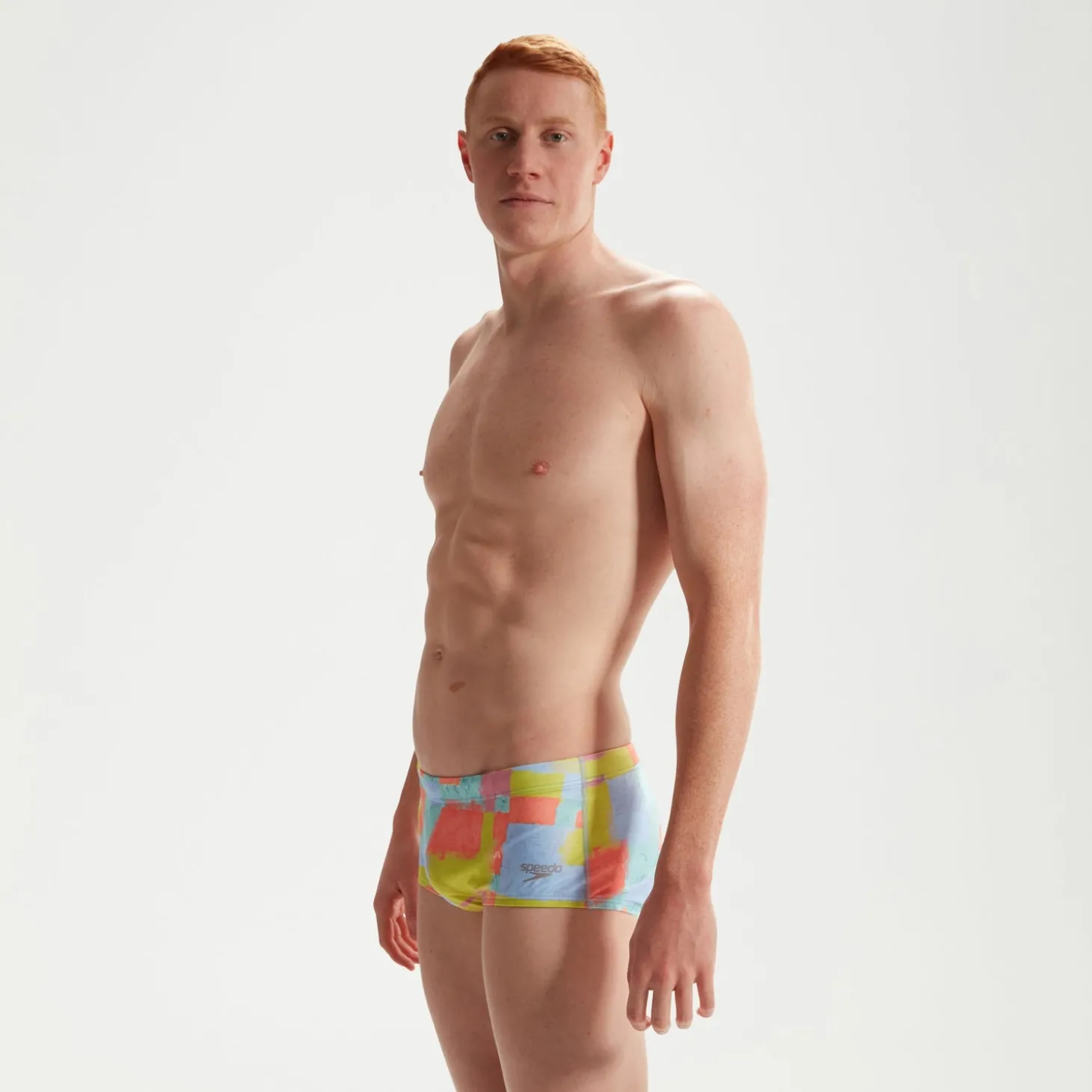 Slip de bain Club Training homme 17 cm Allover Digital Corail/vert/bleu