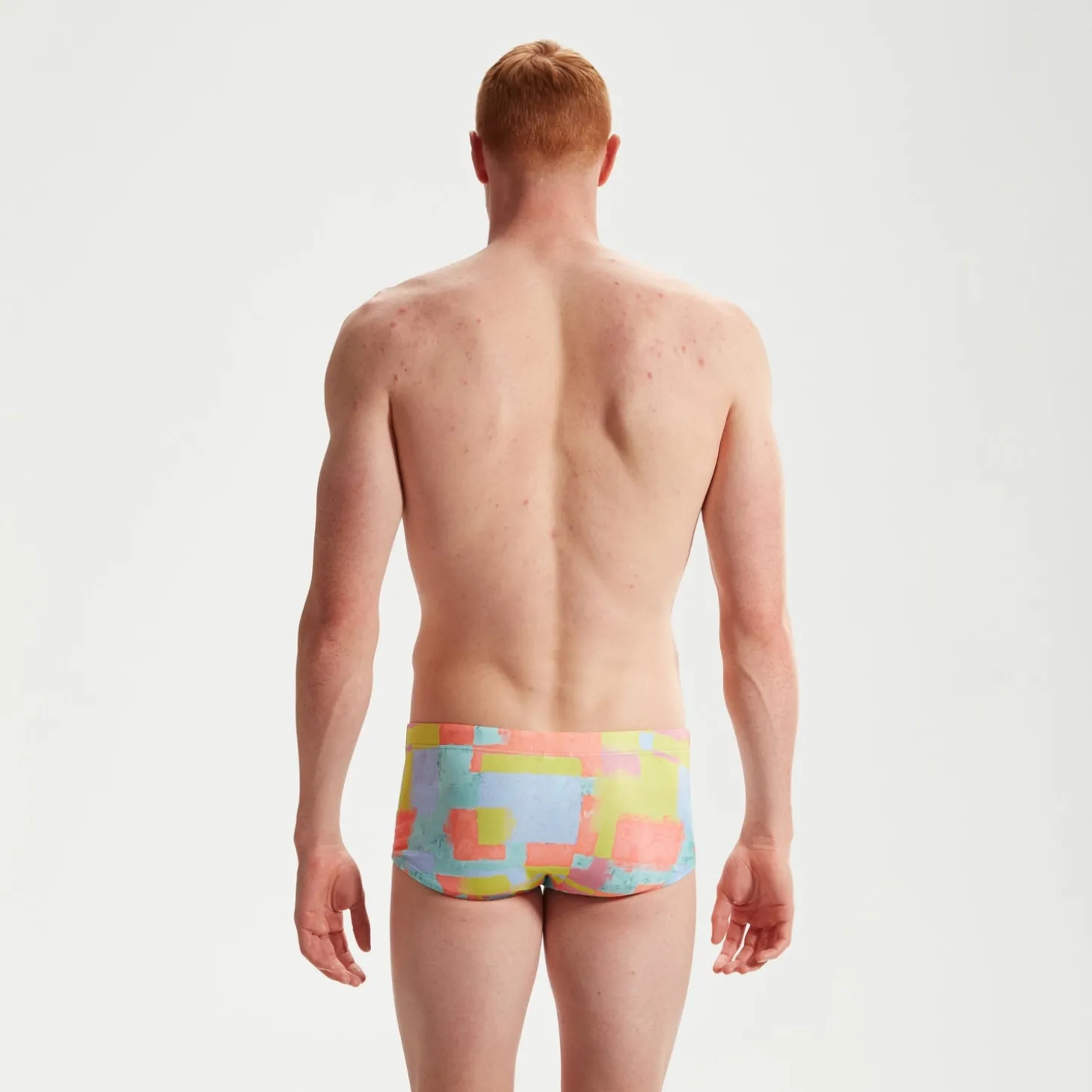 Slip de bain Club Training homme 17 cm Allover Digital Corail/vert/bleu